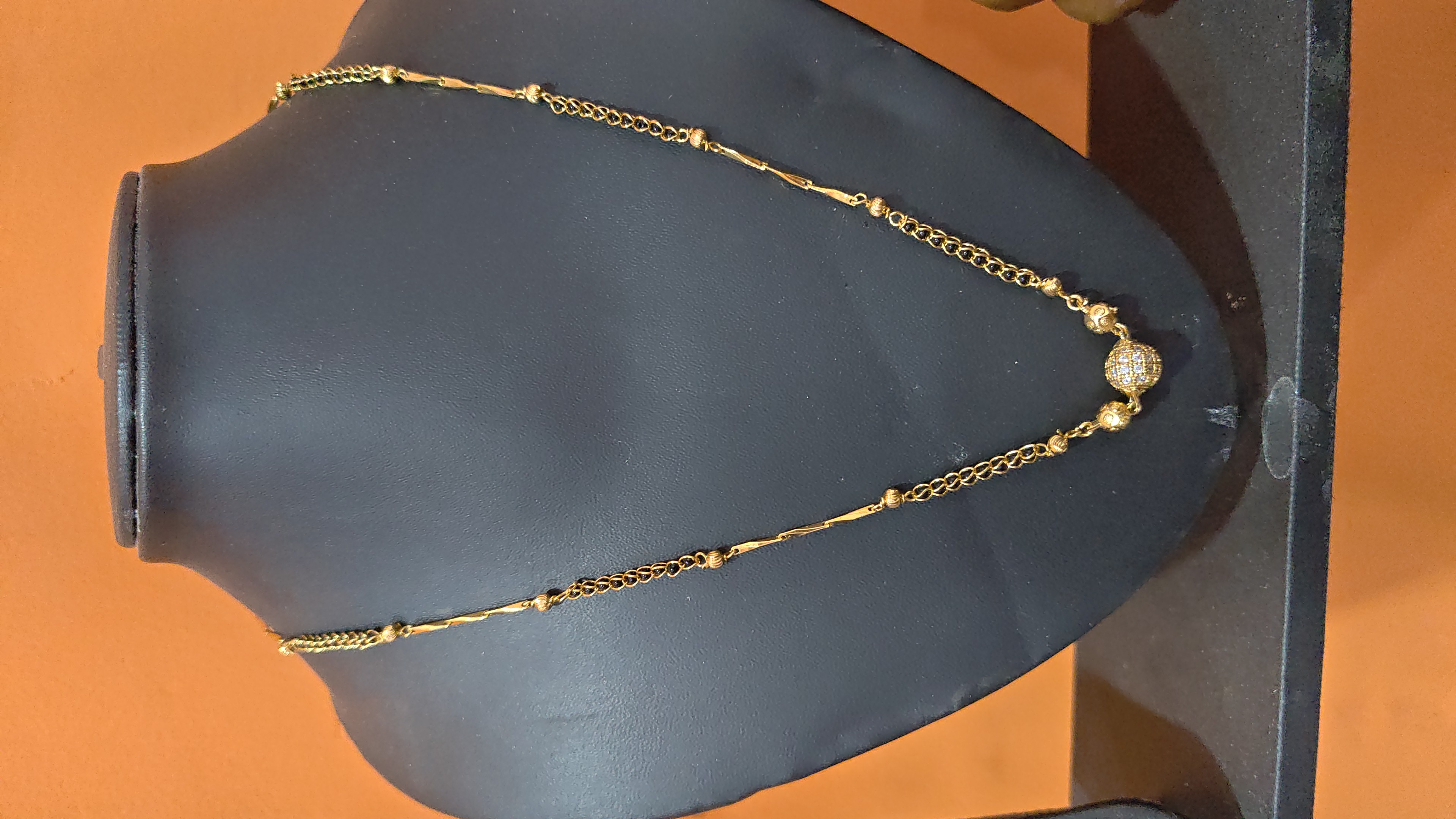 Micro gold plated short black beeds