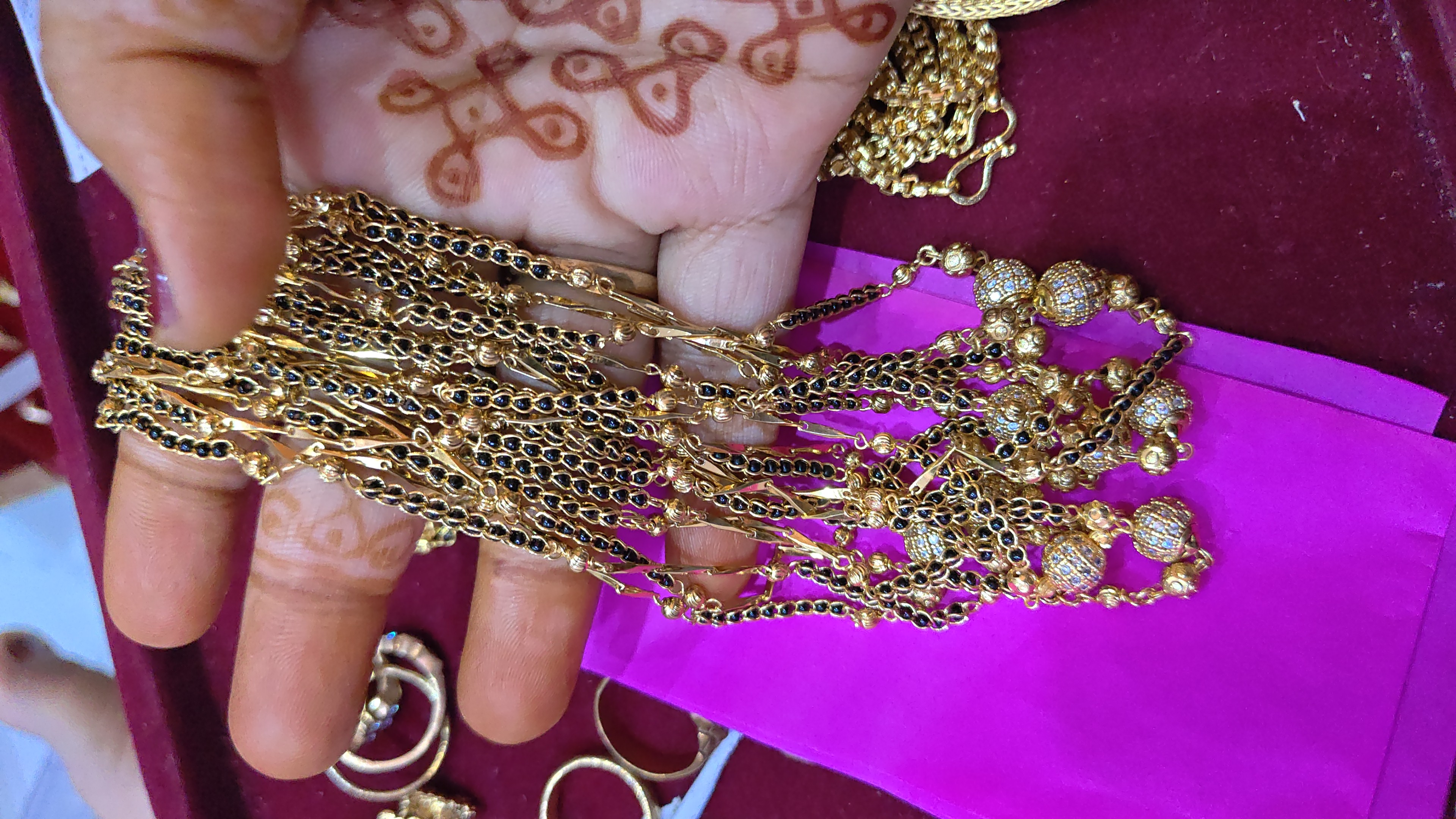 Micro gold plated short black beeds