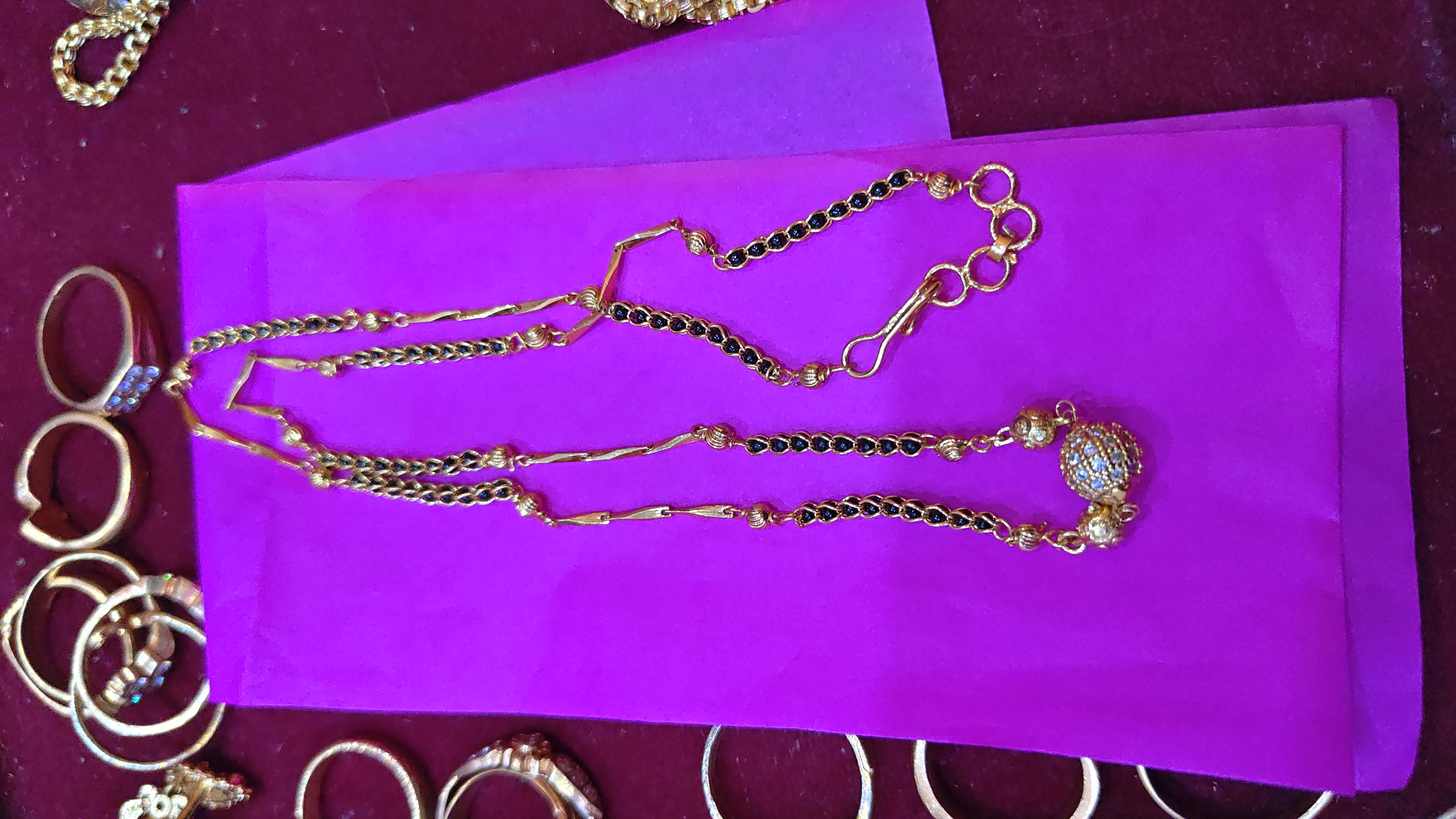 Micro gold plated short black beeds
